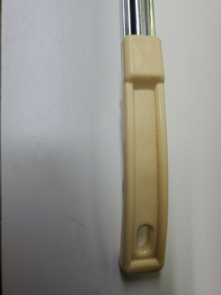 Winco - FPS-3 - 3 oz Beige Solid Portion Spoon