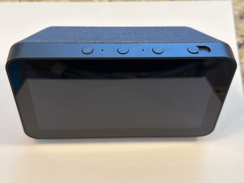 Amazon Echo 5 first generation with Amazon power supply.  Excellent condition.