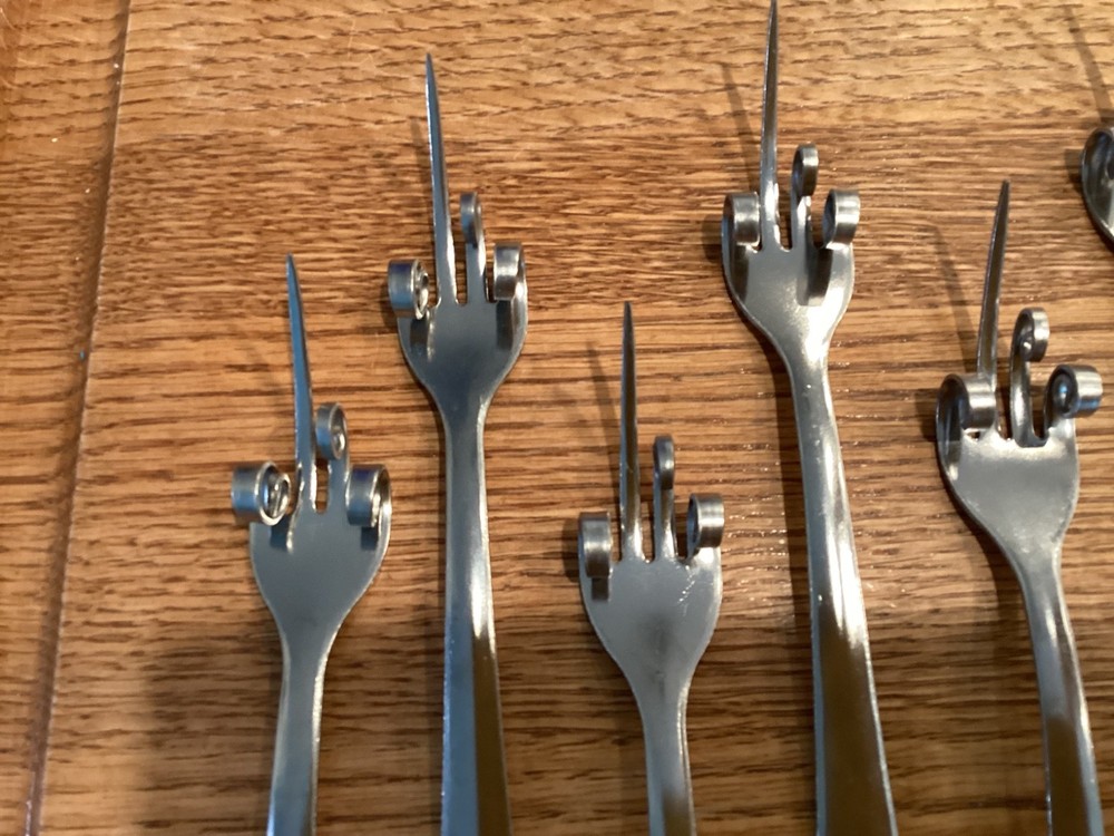 Set Of 6 Olive Forks That Make a Statement