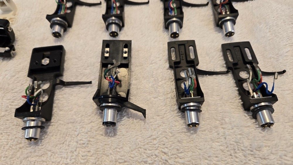 13 Turntable Headshells. 12 OEM Technics, One Pickering. Five P-Mount Adapters