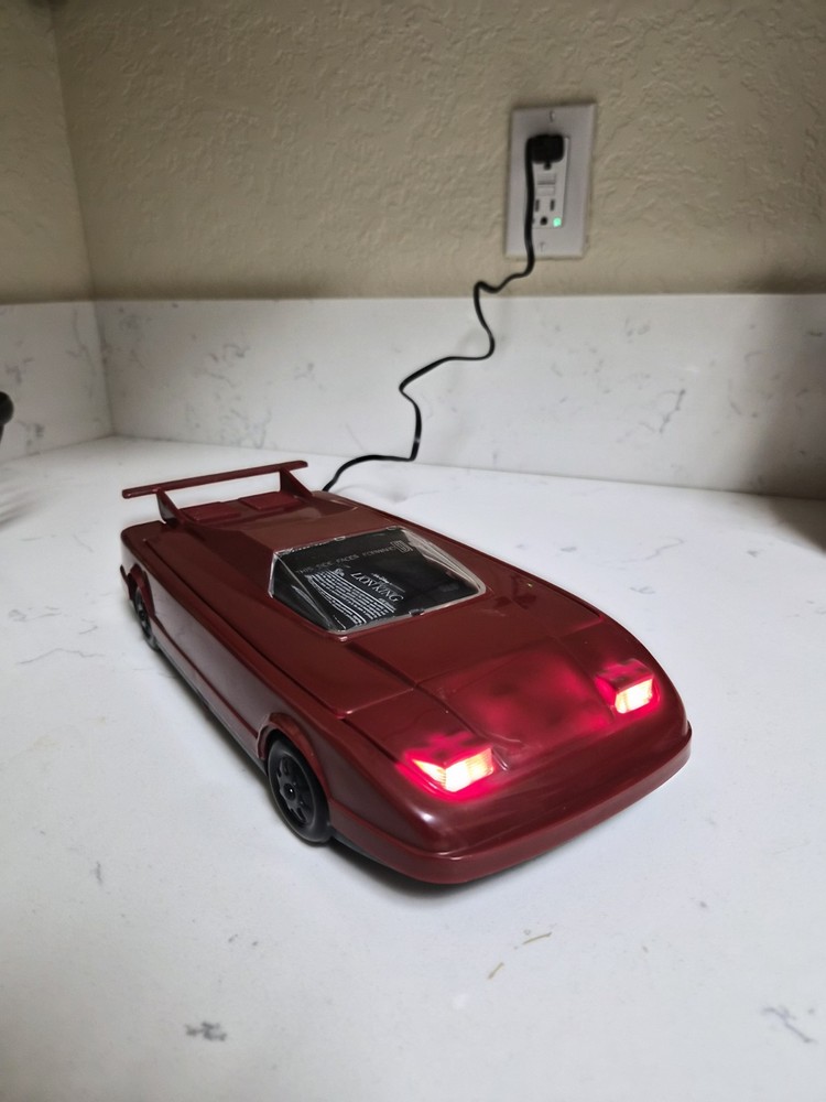 Vintage Red Car Cassette Rewinder. Electronics with Working Lights
