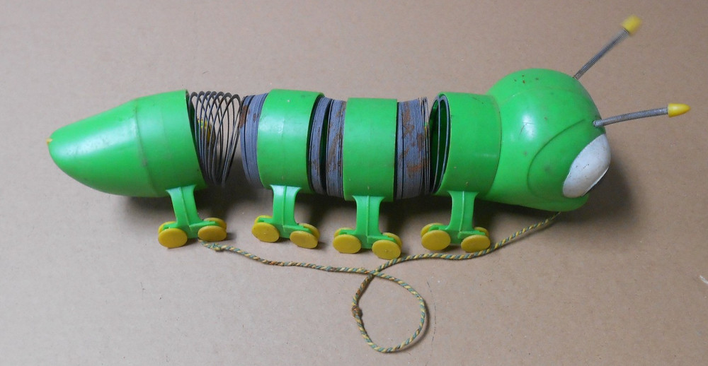 Vintage Caterpillar Slinky Pull Toy