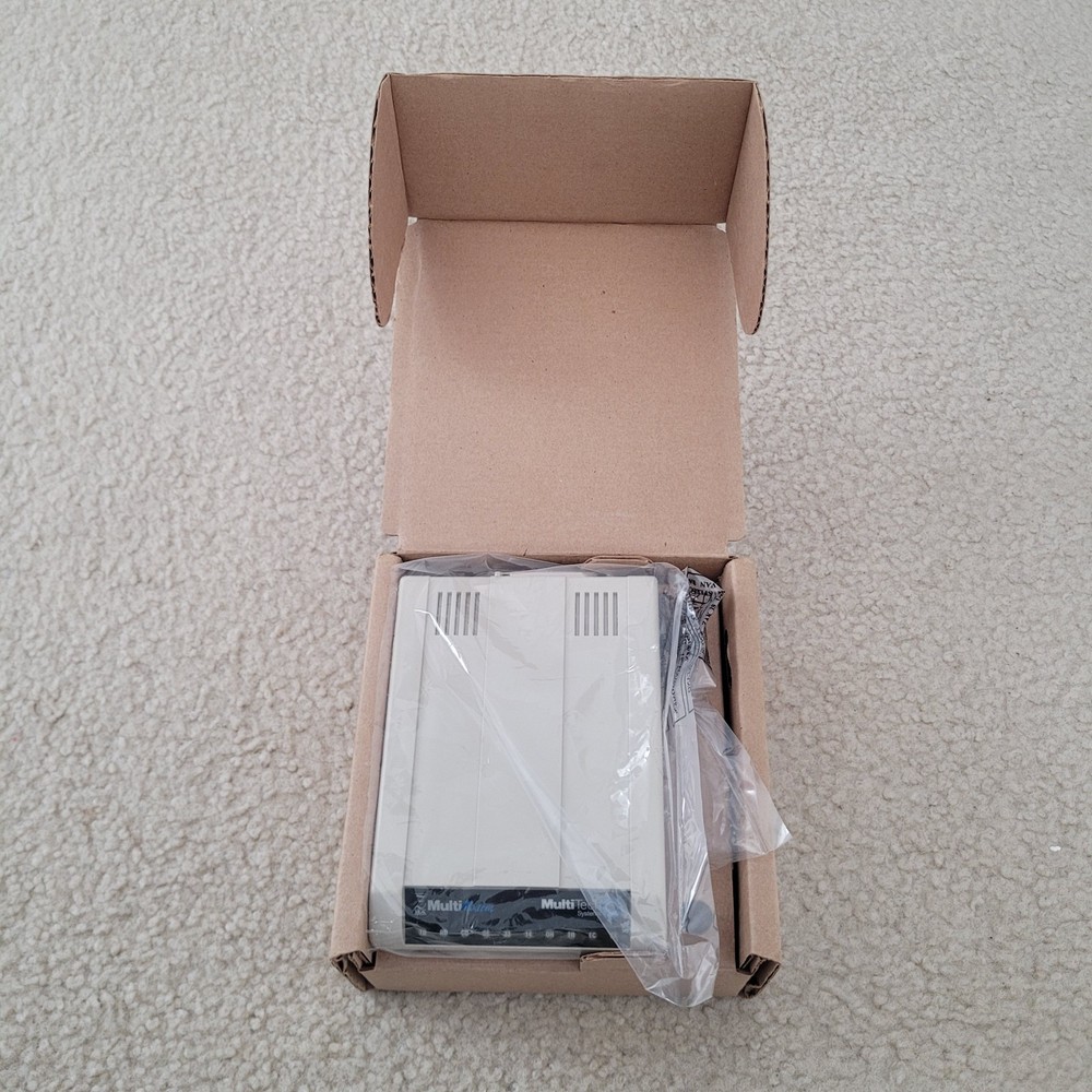 Multitech Systems Multi Modem Model: MT5634ZBA 56Kbps Data/Fax with accessories.