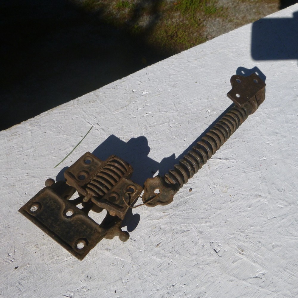 Antique spring loaded door closure