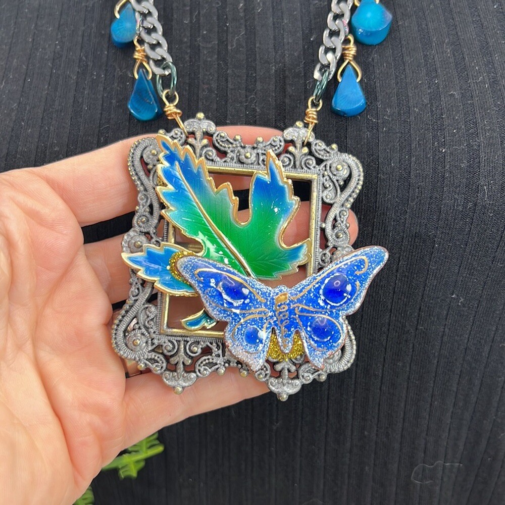 Adorned Crown Artisan Assemblage enamel blue framed butterfly leaf necklace