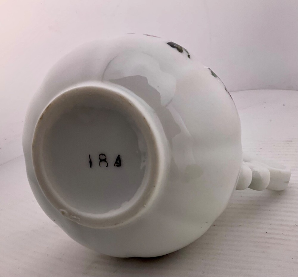 mini pitcher with birds, gold trim Royal Crown?