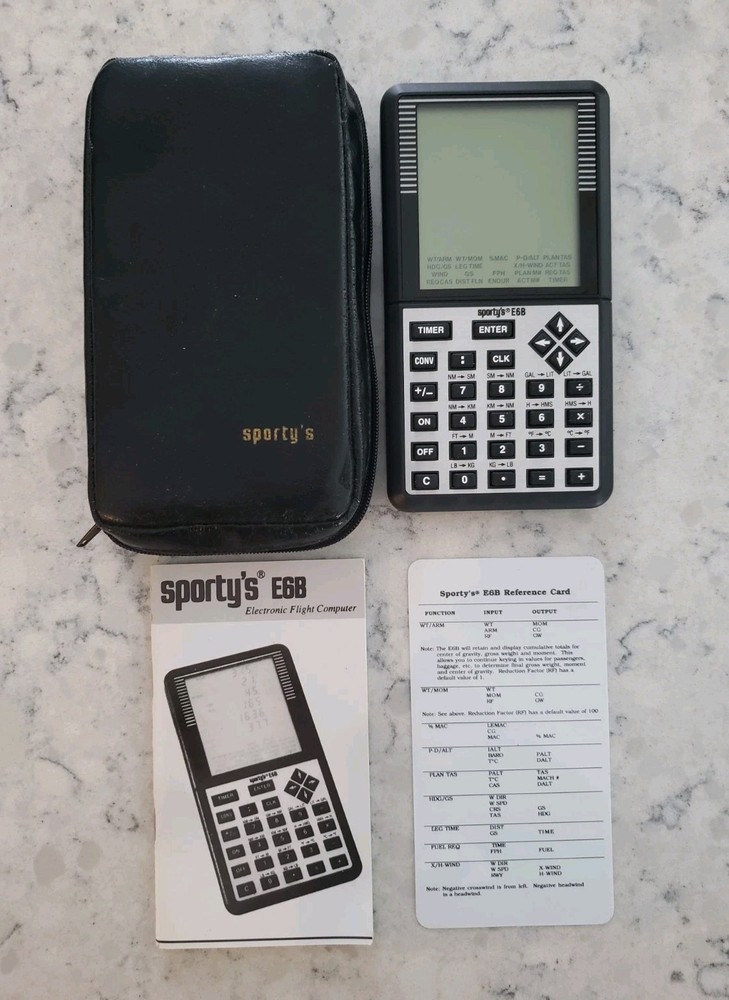 Sporty’s E6B electronic flight computer and Aviation slide computers plates