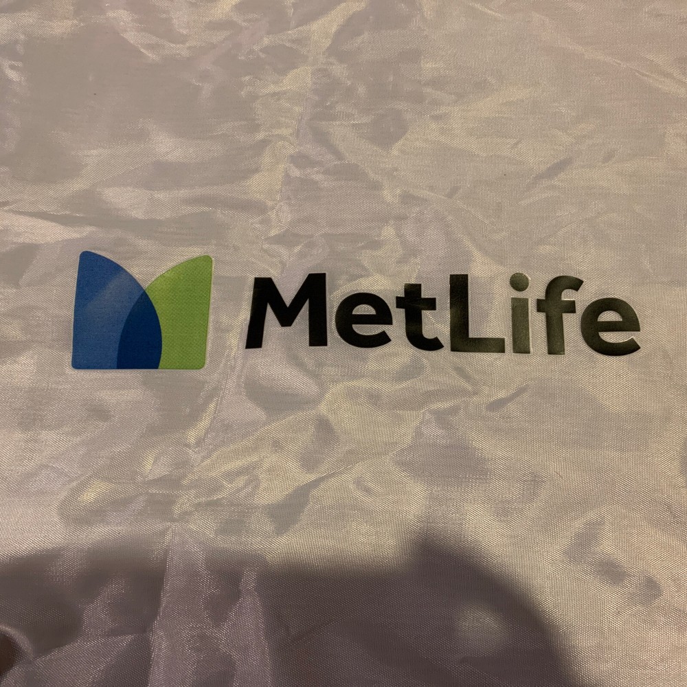 MetLife White Drawstring Backpack