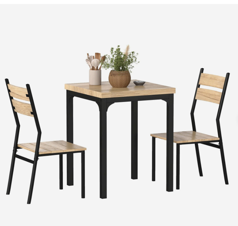 A three-piece kitchen dining set, including a table and chairs
