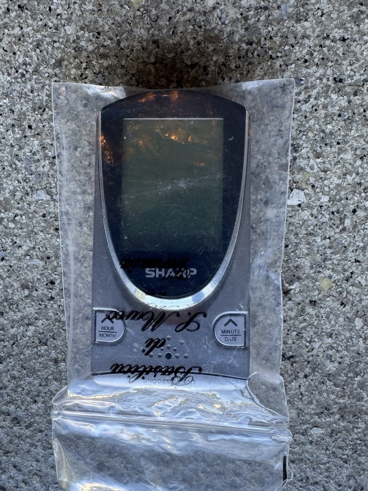 sharp digital travel clock