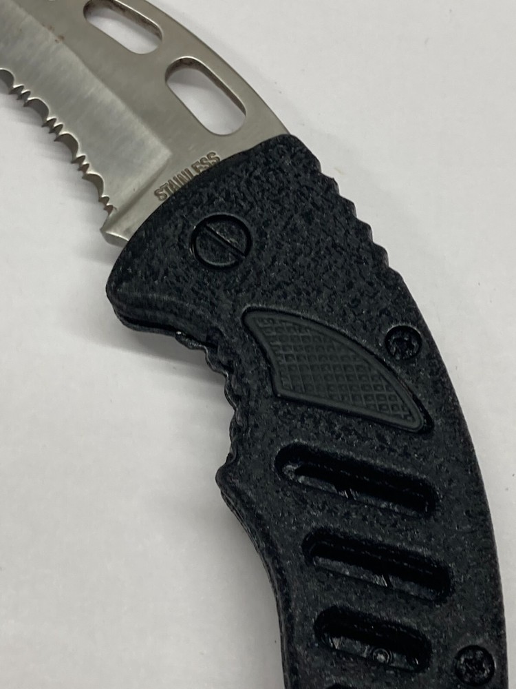 Folding Knife w/Combo Curved Blade C-035