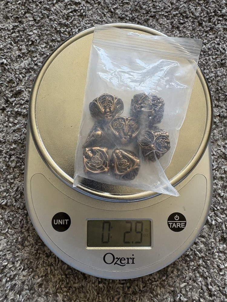 Hollow 7 Pc Metal Dice Skeleton Bronze