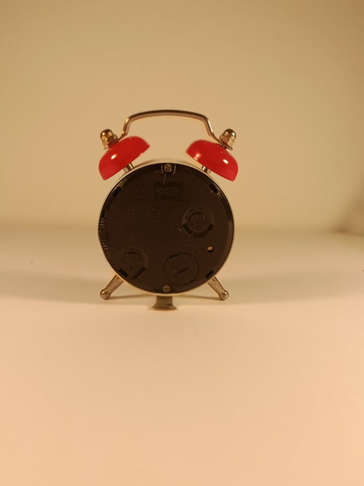 Clock with Austrian motifs and alarm clock