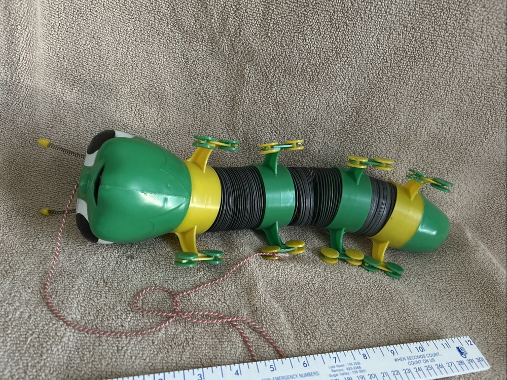 Vintage Slinky Cater-Puller Pull Toy
