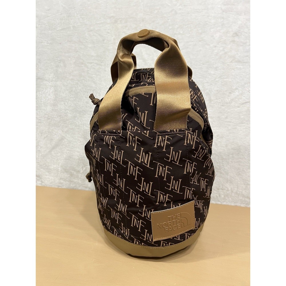 The North Face Never Stop Mini Backpack 5L Brown Tan Monogram NF0A81DV