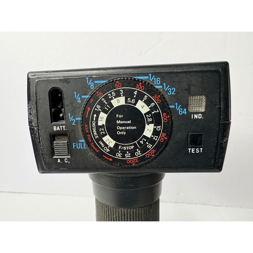 Sunpak Auto 511 Thyristor Handle Mount Flash with Bracket and Sync Cord Black