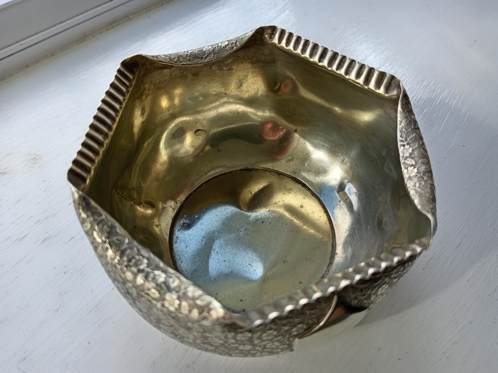 Silver plated very ornate rose bowl.