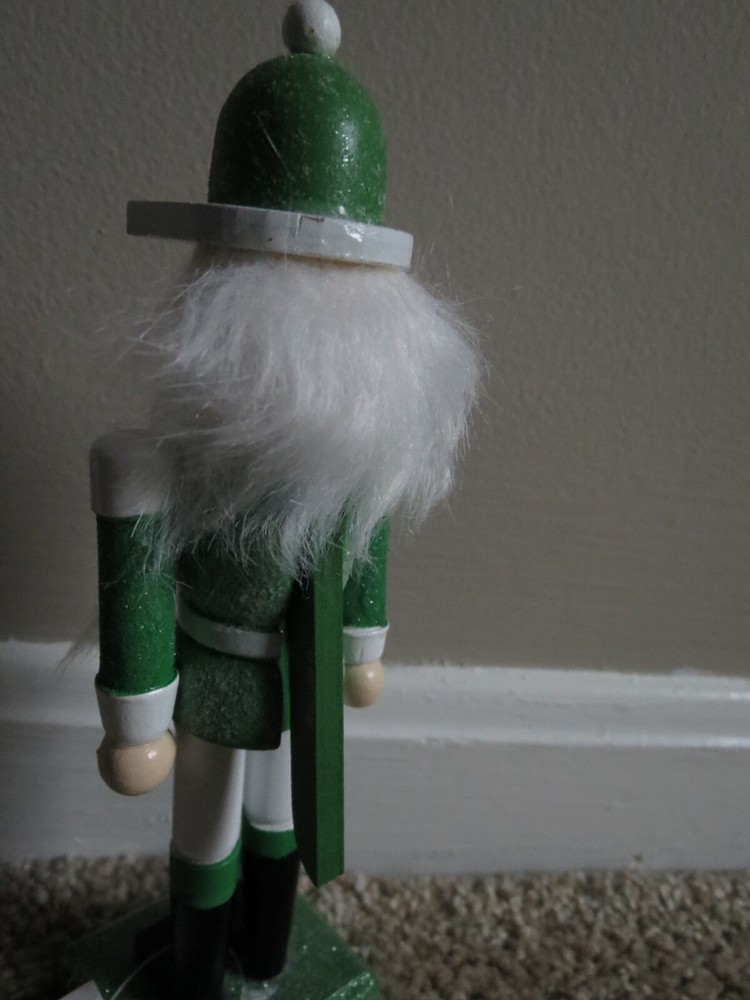 NWT GREEN & WHITE GLITTER WHITE HAIRED NUTCRACKER FIGURINE ON STAND