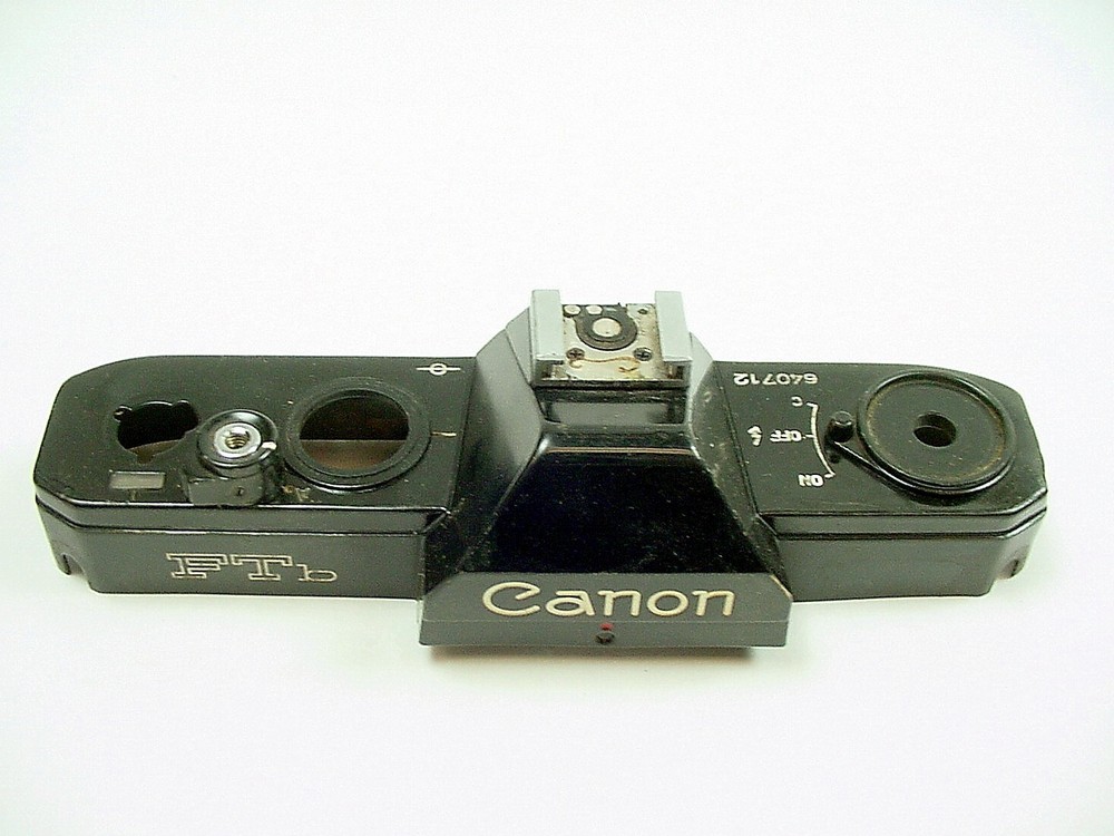 Canon FTB top black | paint touched up | end dent | $9 |