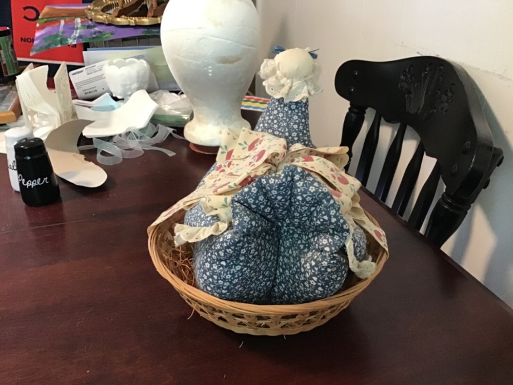 chicken pin cushion in a basket