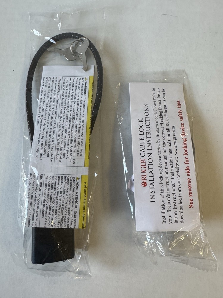 TWO GUN CABLE LOCKS WITH TWO KEYS FOR EACH