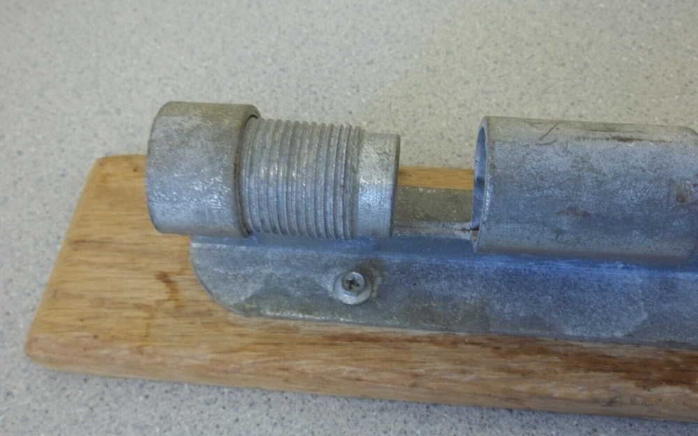 Nutcracker with red handle knob on wooden base Vintage adjustable nutcracker
