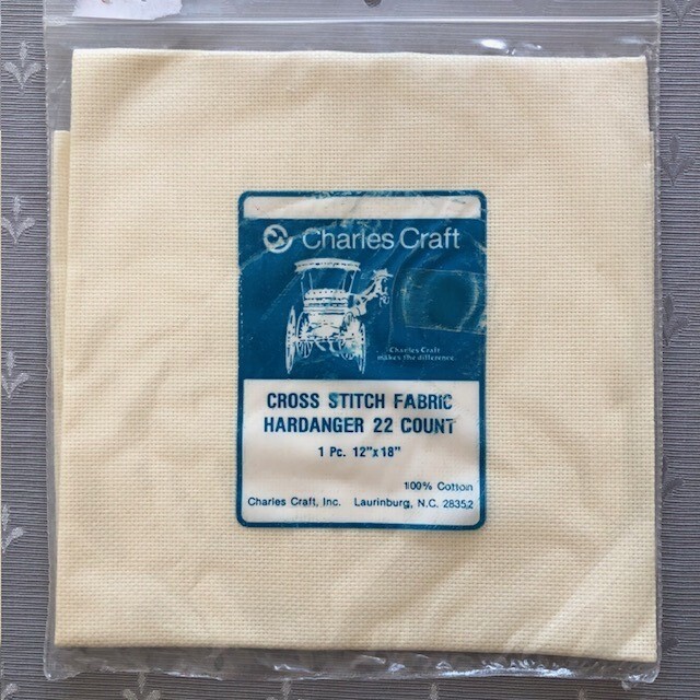 6 various cross stitch items - 2 Keepsake cones, 3 Aida cloths and 1 thread lock