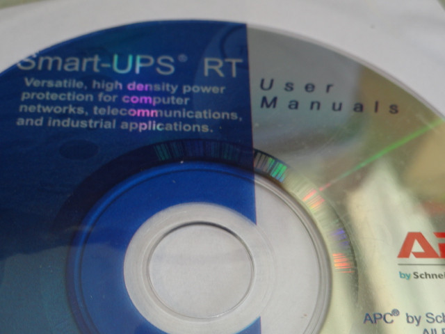 C4: New APC Smart-UPS RT User Manual CD-ROM with cable