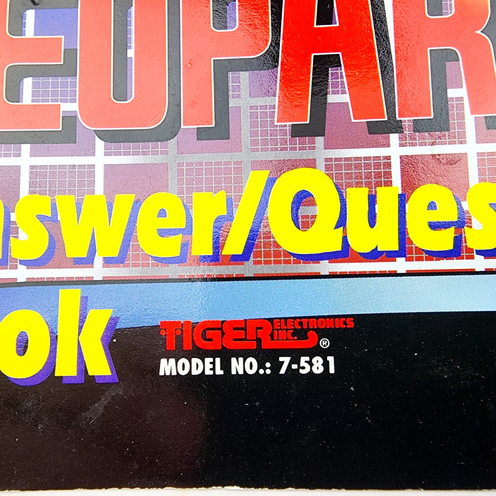 1995 Tiger Electronics Jeopardy Game Model 7-581 Answer Question Book
