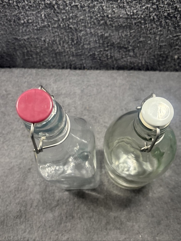 2 Old Fashioned Style Bottles With Flip Lids