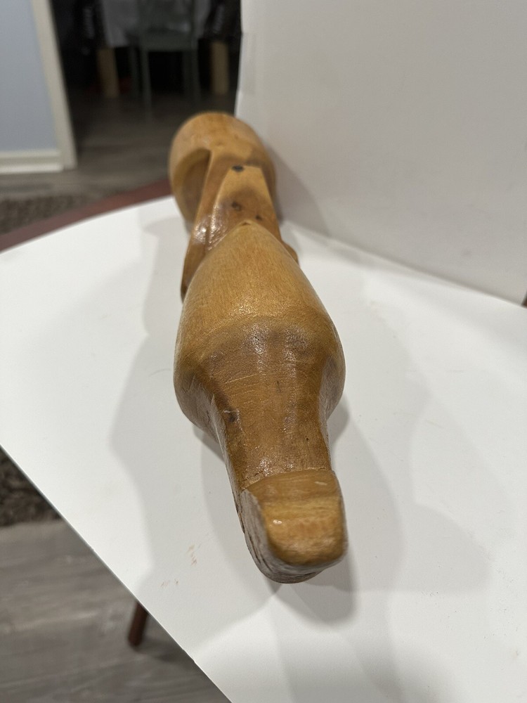 carved wooden parrot