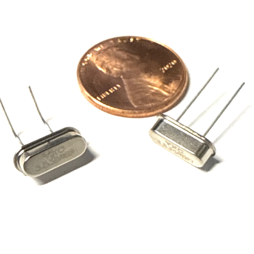 2 pcs 7.035 MHz Crystal. HC49/S