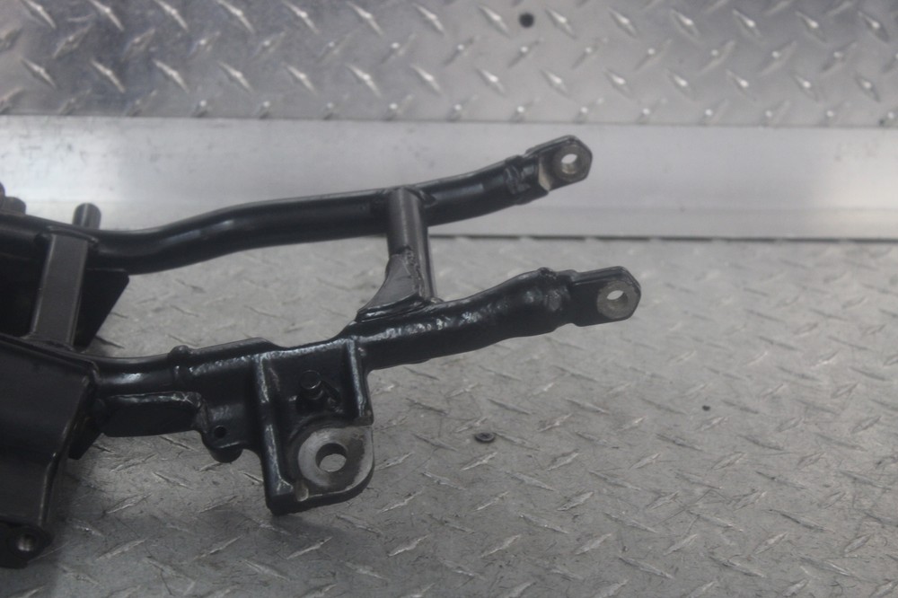 2004 SUZUKI GZ250 LOWER FRAME RAIL FOOTPEG BRACKET MOUNT