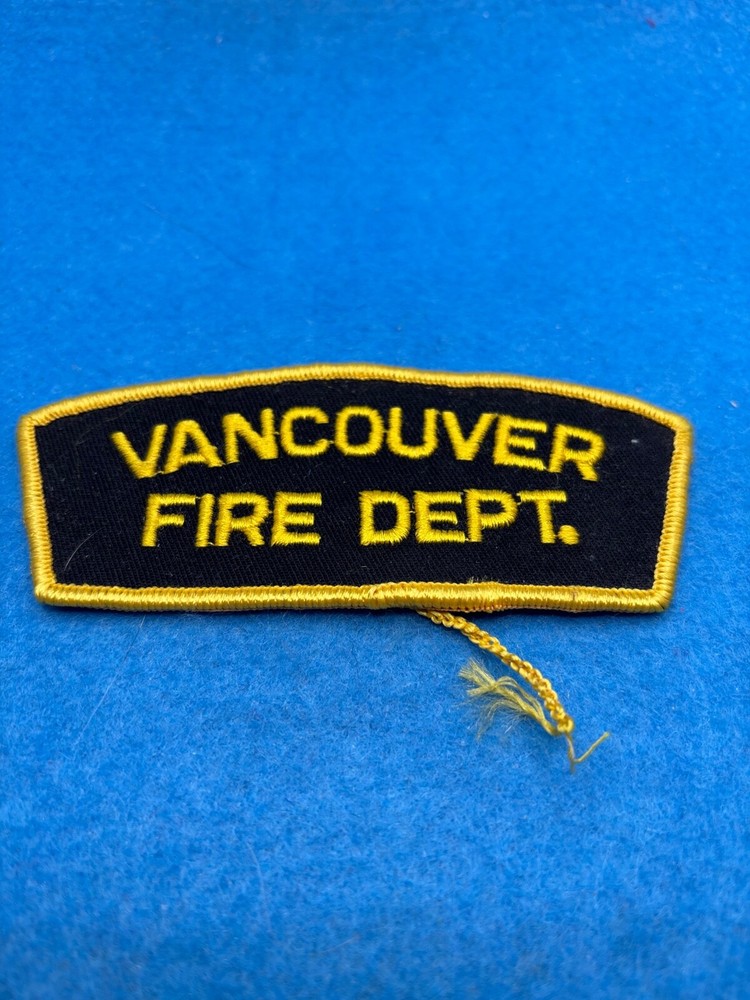 Shoulder Vancouver yellow lettering on blue