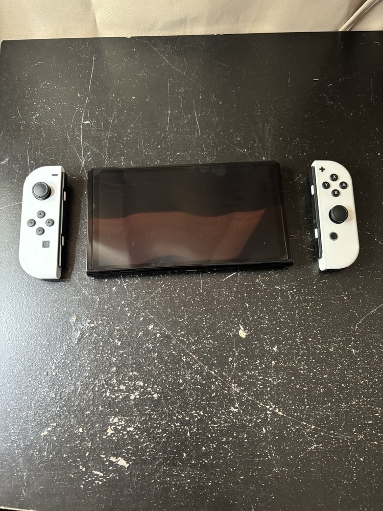 Nintendo Switch OLED Bundle with Joy-Con Controllers, Controller Grip, FC26 Game