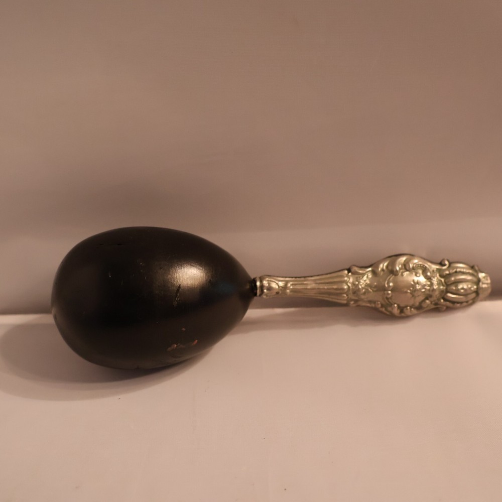 Darner with silver handle