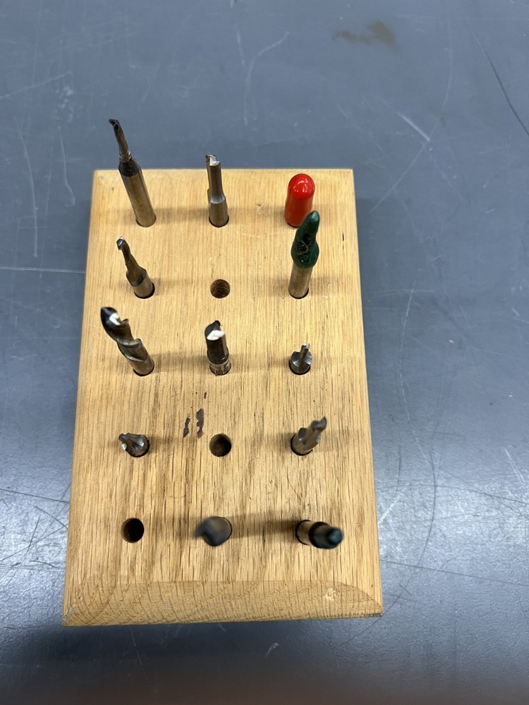 Lot of 12 assorted 1/4" router bits.