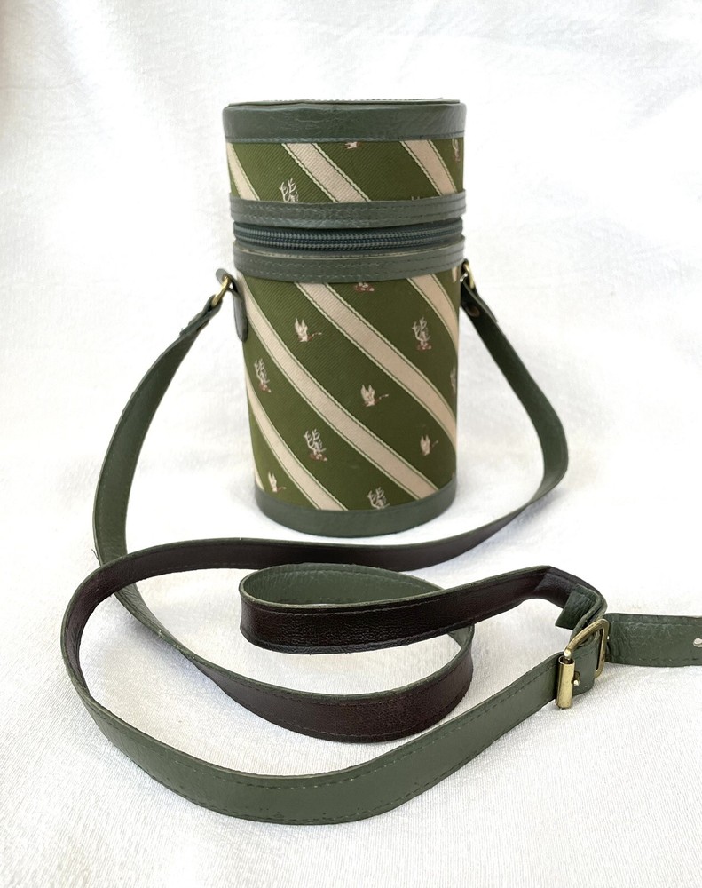 SPLENDID HUNTING STIRRUP CUP CASE WITH THREE SILVER PLATE MOUNTED FLASKS.