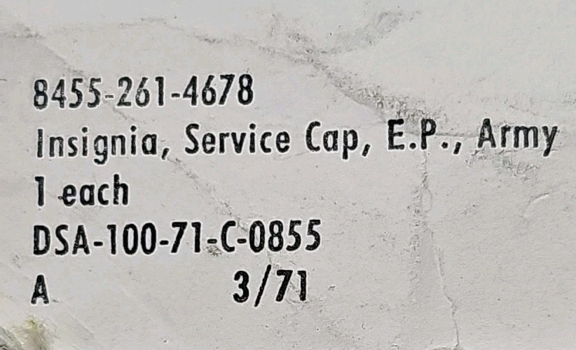 US Army Enlisted Service Cap Device Worn With Green Service Uniform.