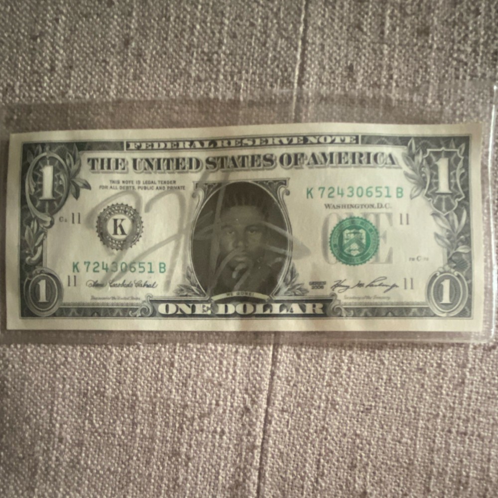 Signed Reggie bush dollar bill