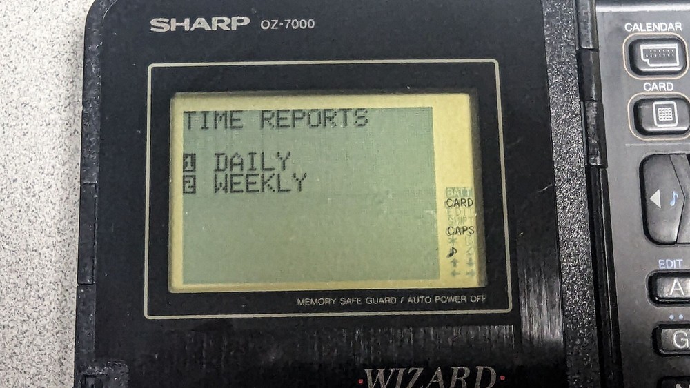 Sharp Wizard OZ-7000 Electronic Organizer with Time & Expense Manager Card