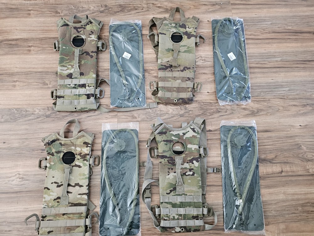 4 USGI OCP Camelbacks with New In plastic Bladders
