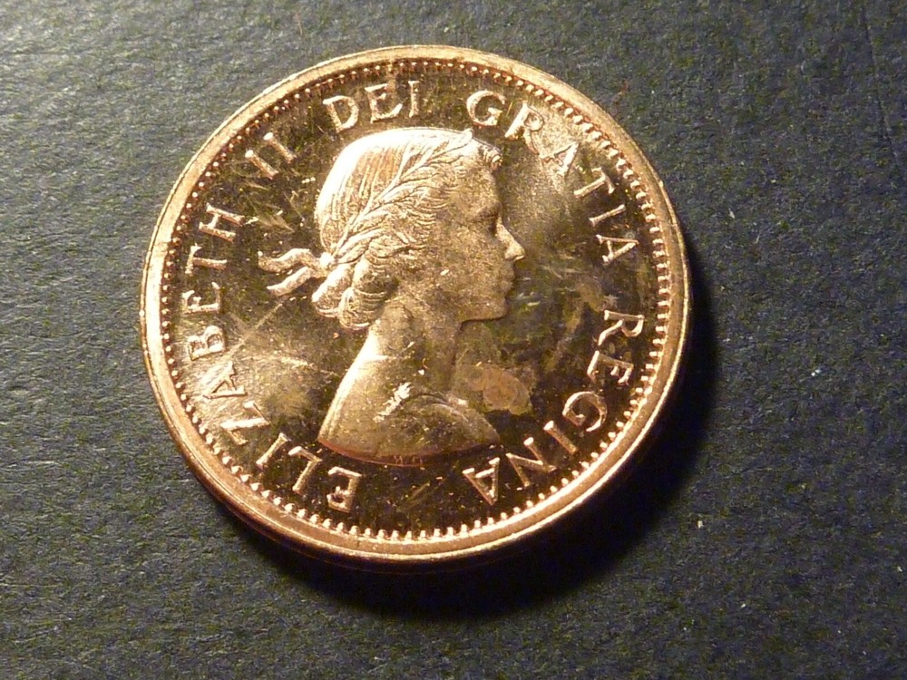 ERROR - BU Canada 1963 1-cent, partial collar (minor rim fin)