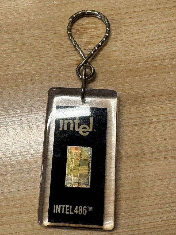 Intel 386 and 486 processor CPUs - both encased in one acrylic keychain