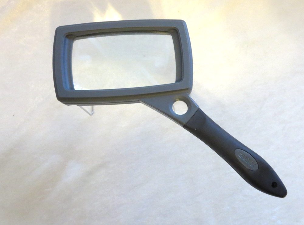Carson hand held magnifier with fold out legs