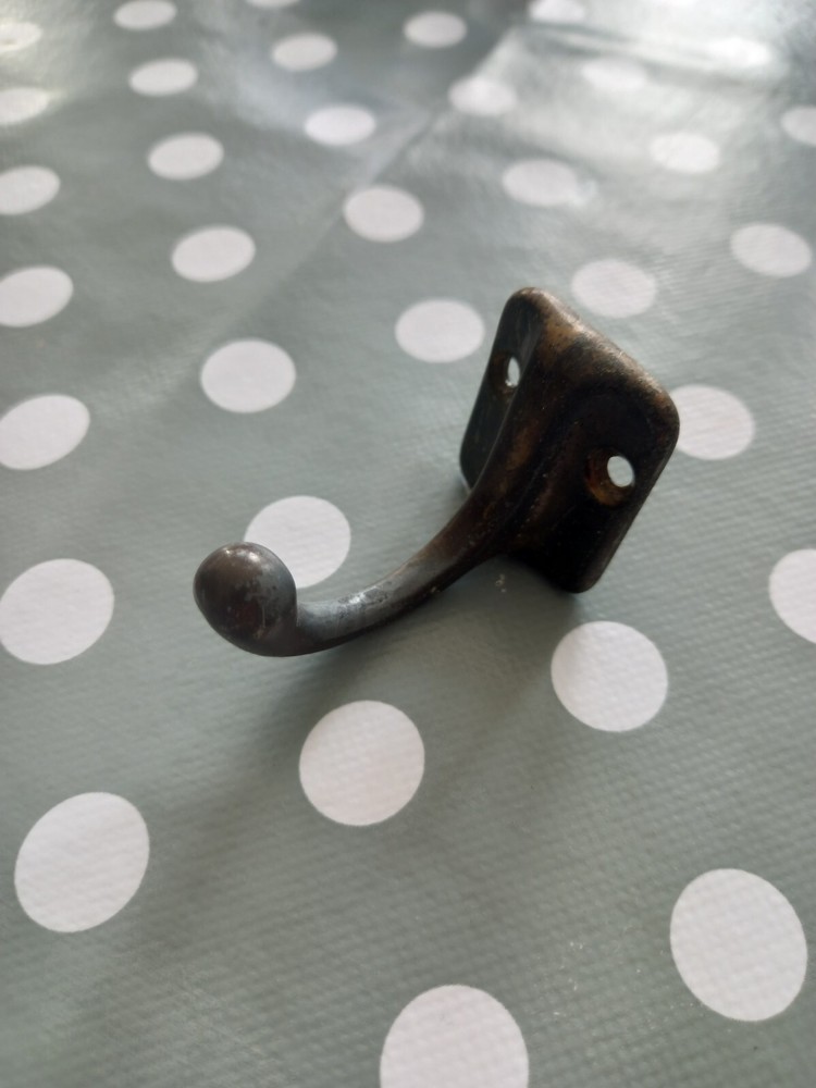 Reclaimed brass coat hooks