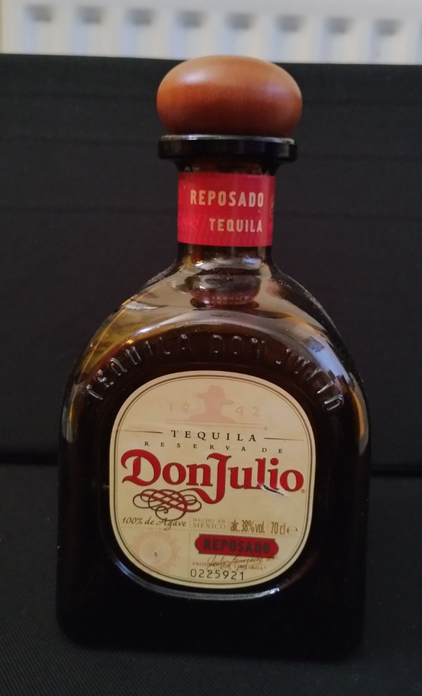 Empty DonJulio tequila bottle 70cl with stopper.