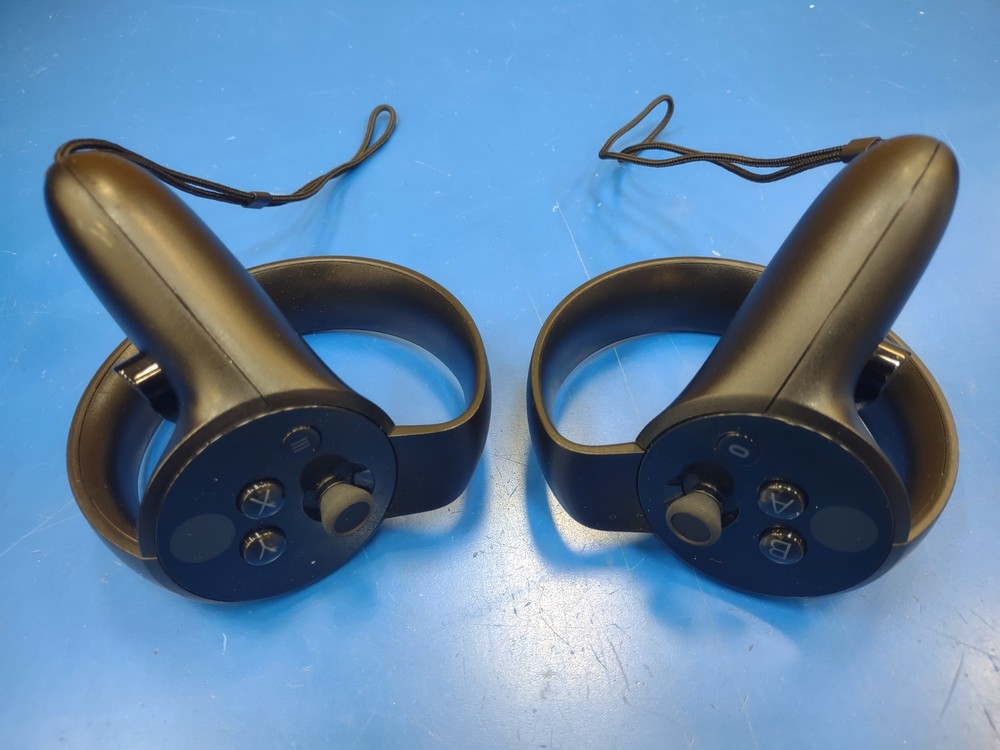 Oculus Rift VR Headset with controllers, sensors, and original box