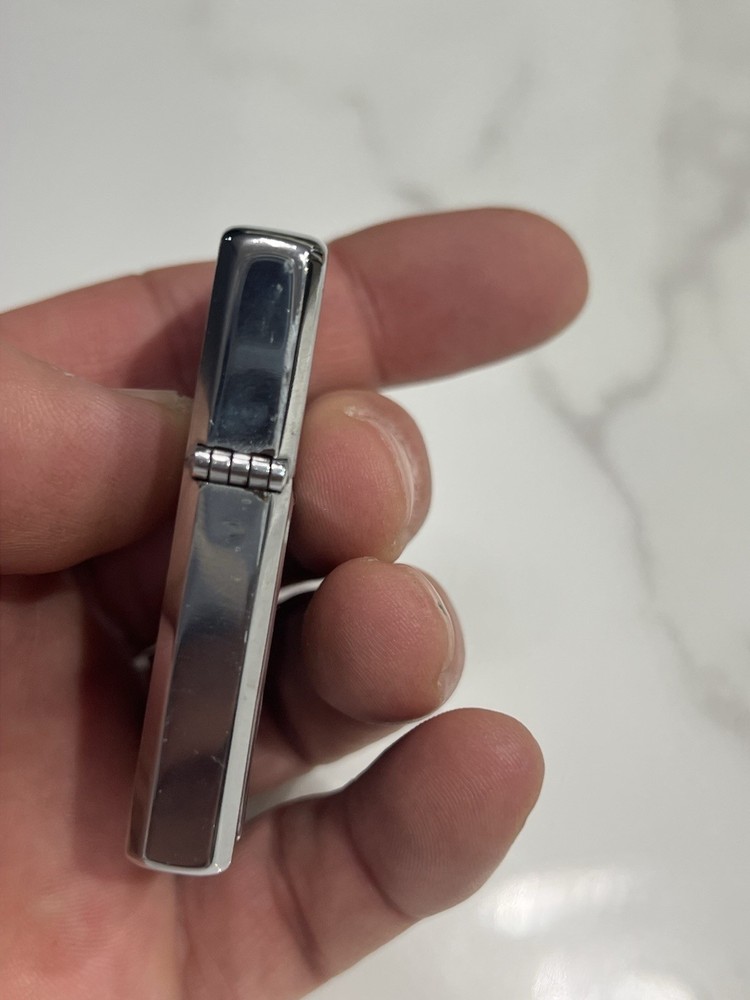 vintage “lowrey” silver matchbox holder