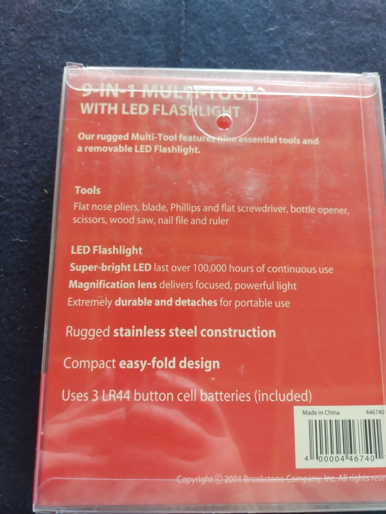 Brookstone® 9-in-1 multi-tool with flashlight pocket size tool NIB
